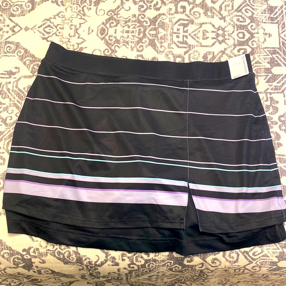 Brand new, with tags golf or tennis skort